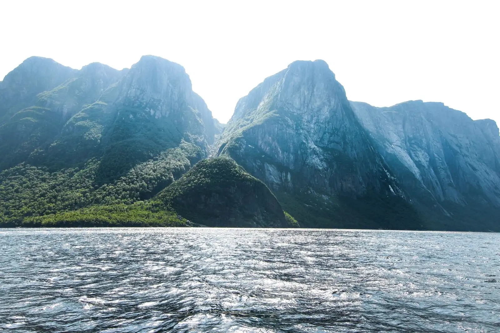 Steep fjord cliffs rising from the water at Gros Morne National Park, Newfoundland